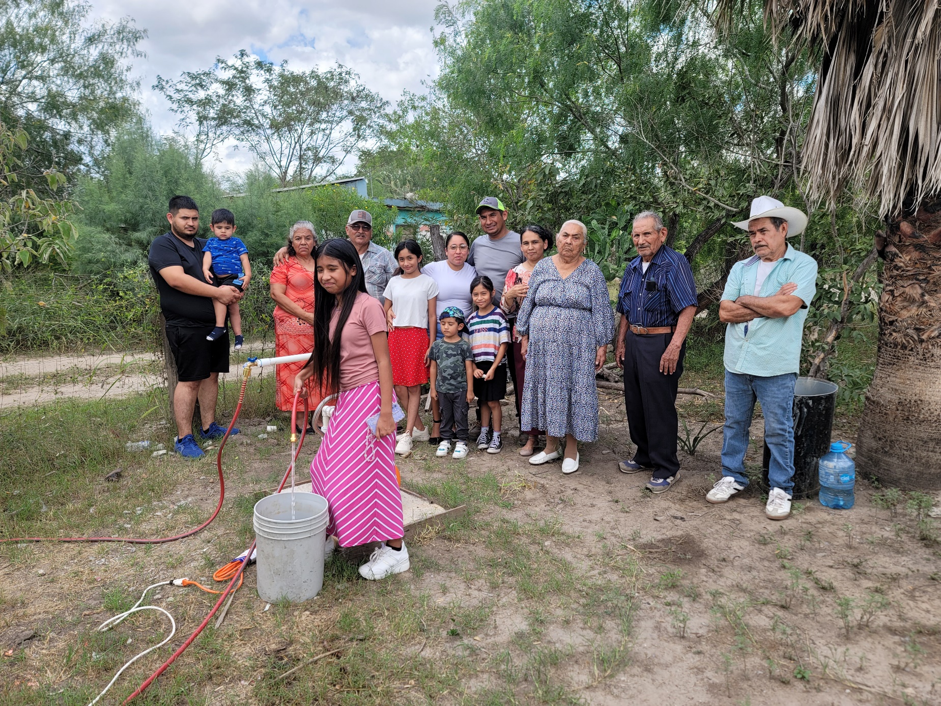 A group of people standing in a line
AI-generated content may be incorrect.
