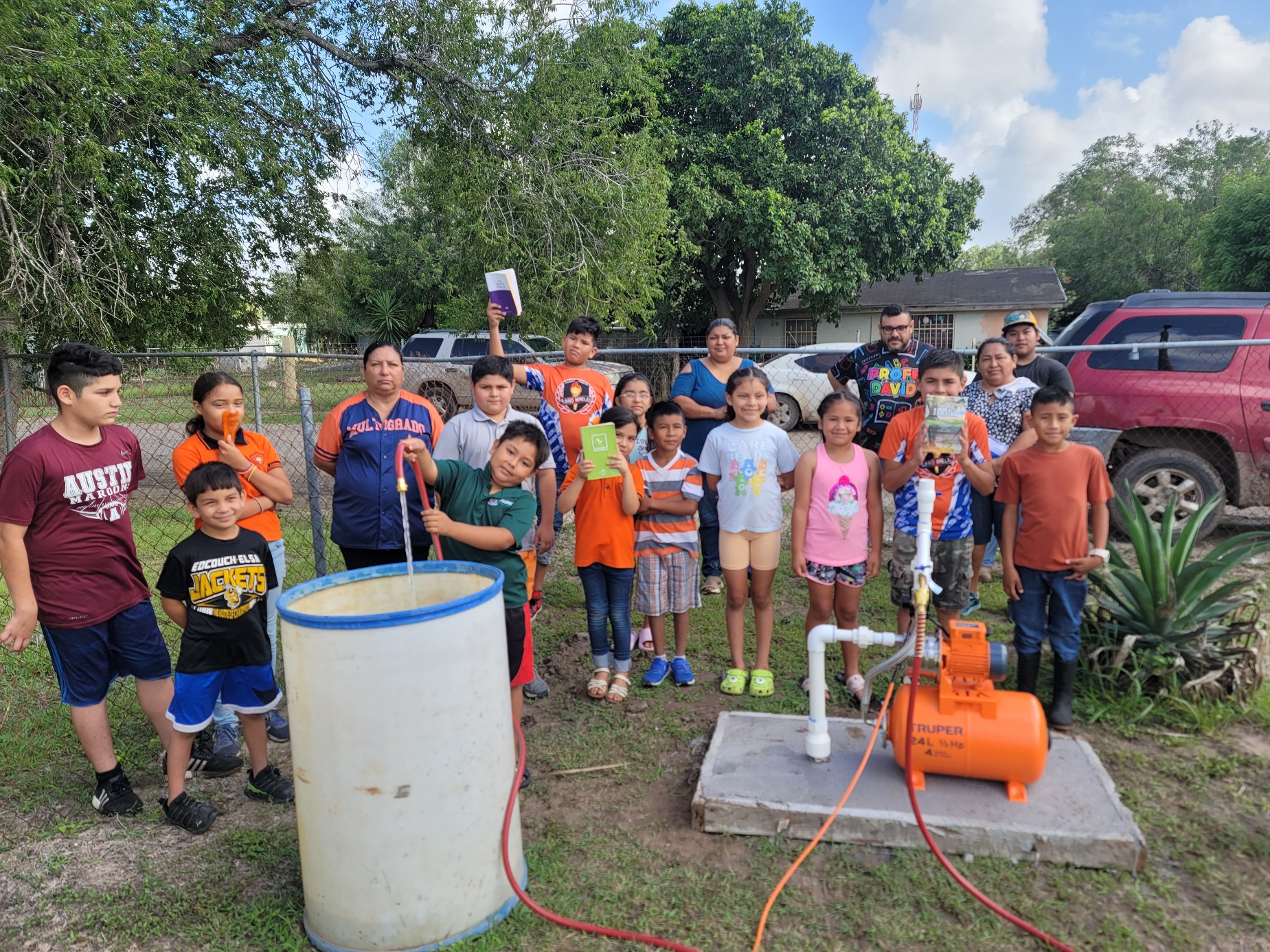 A group of people standing in a yard
AI-generated content may be incorrect.