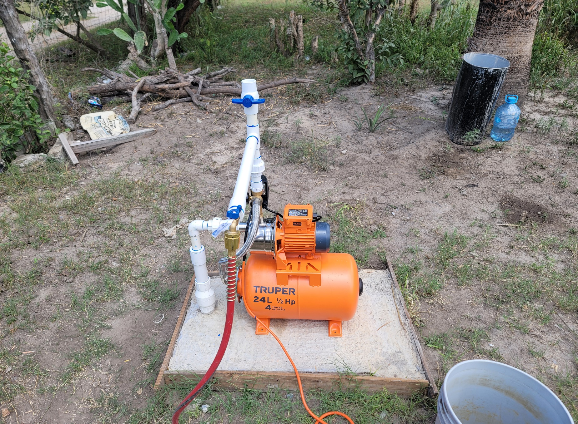 A pump on a concrete slab
AI-generated content may be incorrect.