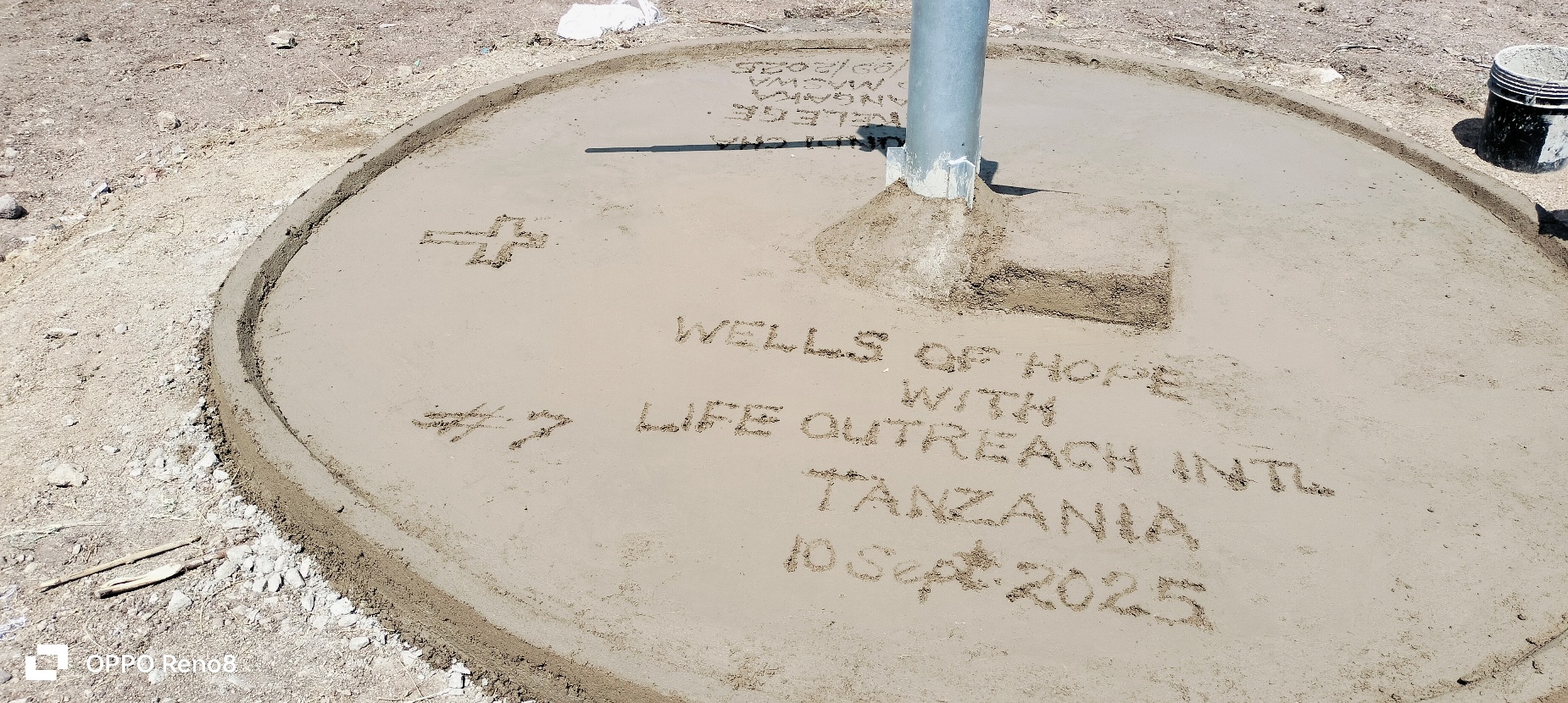 A circular concrete circle with writing on it
AI-generated content may be incorrect.